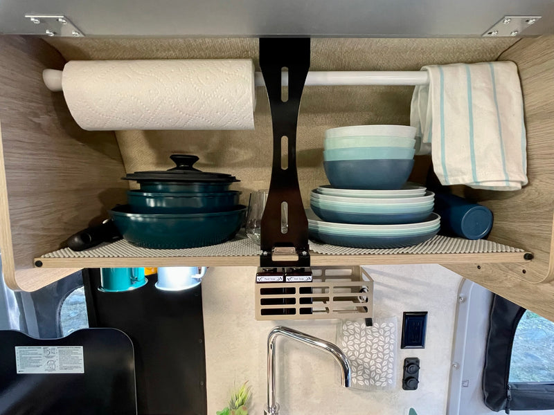  ready for adventure.|Efficient RV rental kitchen cabinet with paper towels — photo 2