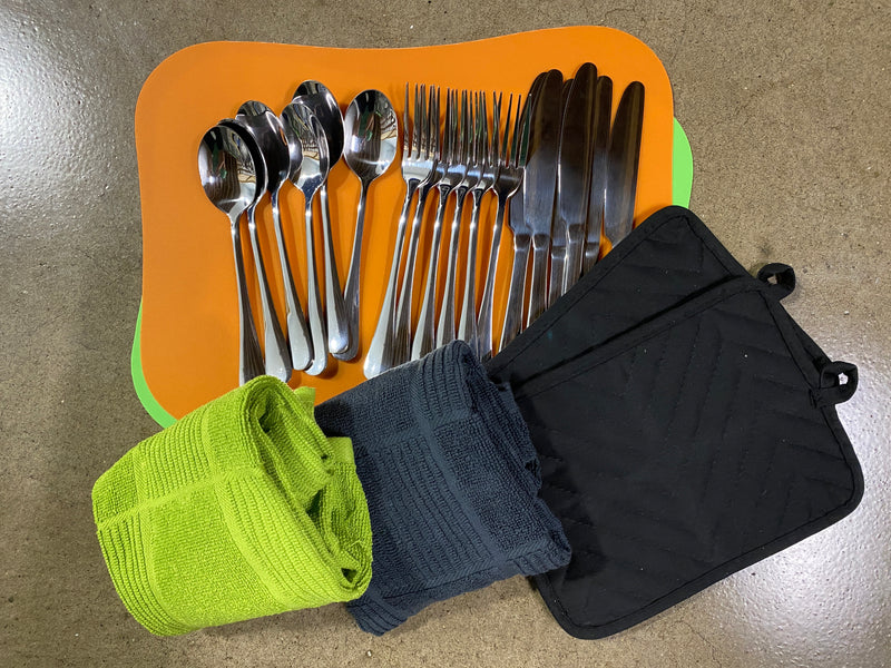 RV rental kitchen setup: cutlery, cutting boards, towels, and pot holders. Ready for your adventure! — photo 19
