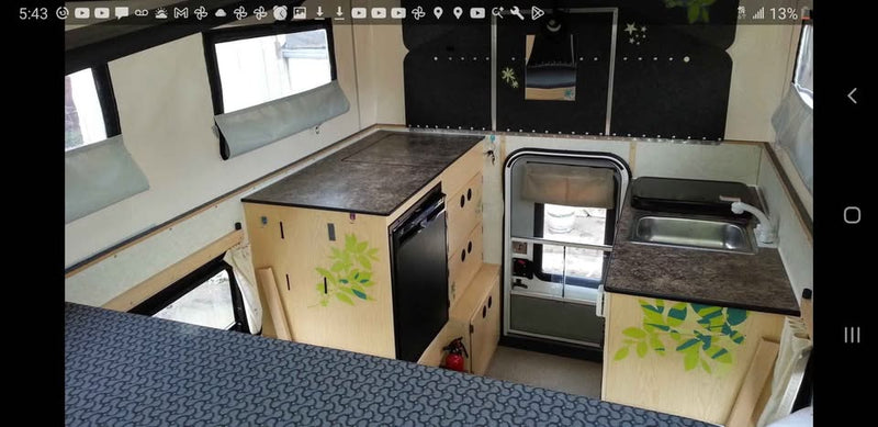 Four wheel camper fleet model front dinette in Denver, CO (photo 8) — photo 8