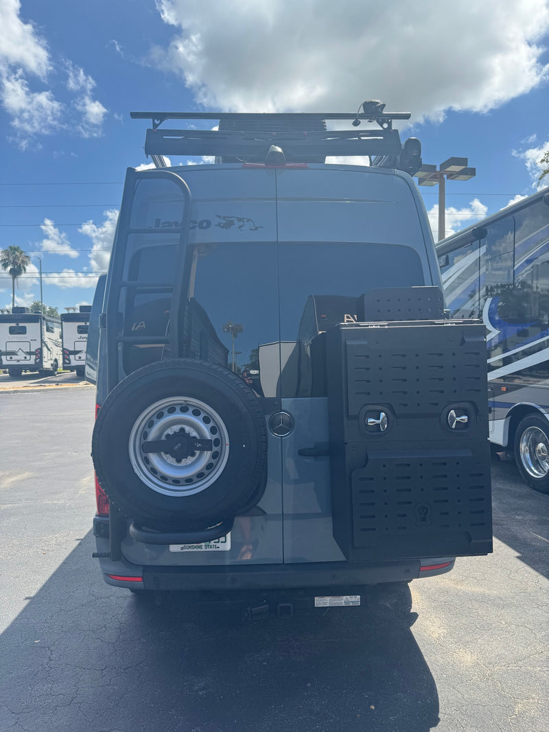  under a dramatic cloudy sky with sunrays.|Grey Mercedes Sprinter camper van — photo 3