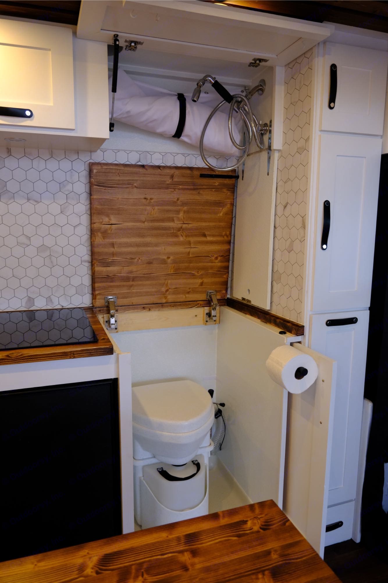  & wood features. Ideal for travel.|Modern RV rental interior: well-designed kitchen with wood counters — photo 6