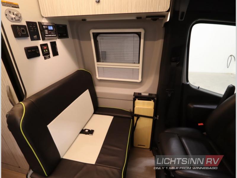 and spare tire.|This 4x4 Winnebago Sprinter **RV rental** boasts a roof ladder — photo 12