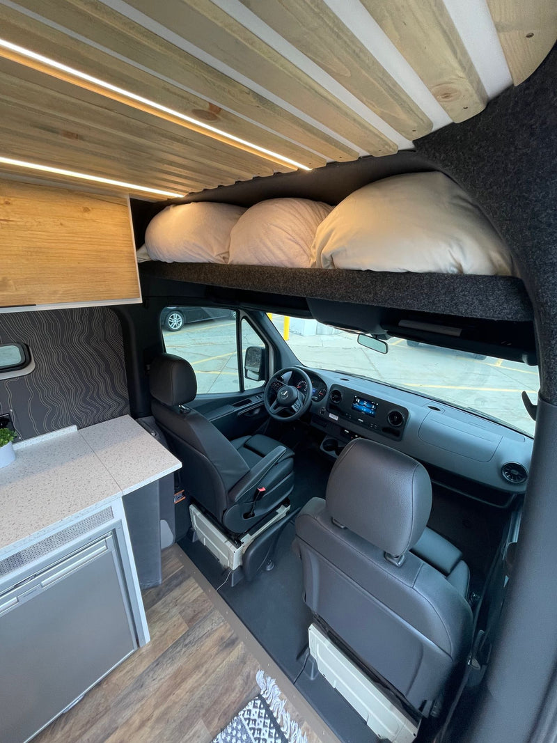  well-designed RV rental interior showcasing a full kitchen — photo 16