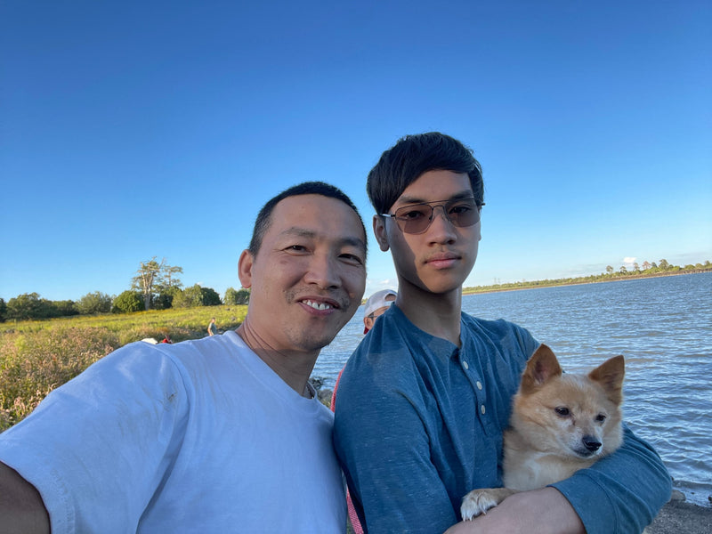Father, son & dog by lake; ideal scene for your next RV rental adventure. — photo 8
