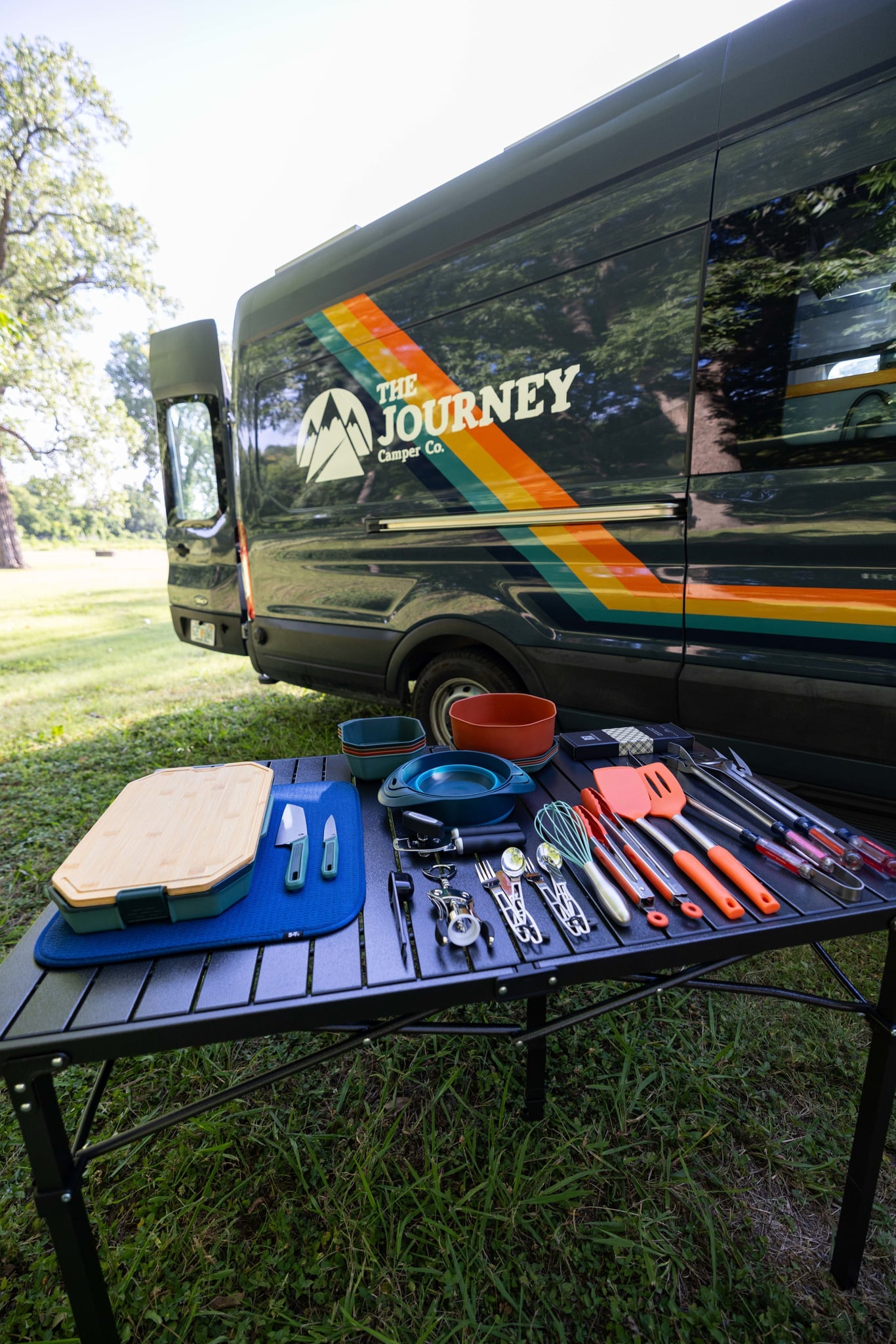  parked on grass.|Relax & explore! Grey 'The Journey' camper rv rental