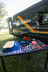  parked on grass.|Relax & explore! Grey 'The Journey' camper rv rental