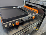 Blackstone griddle & burner setup in an RV rental outdoor kitchen.