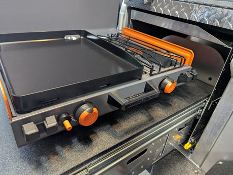 Blackstone griddle & burner setup in an RV rental outdoor kitchen.