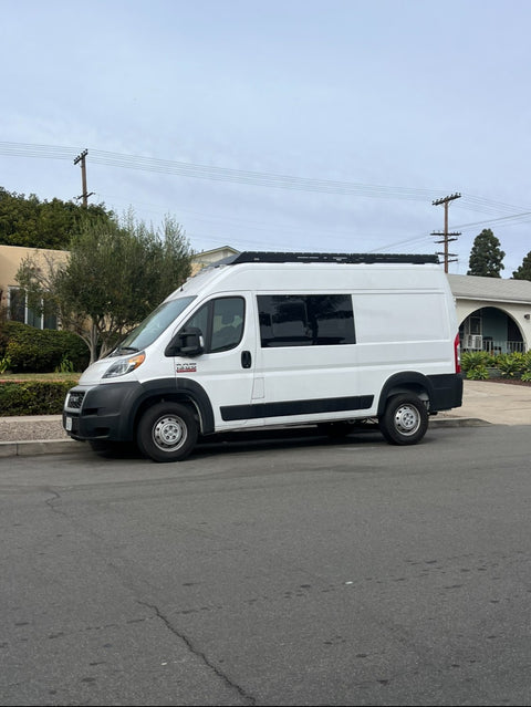 New, bright, clean, custom camper. Roof deck! Bench seating. overland rental