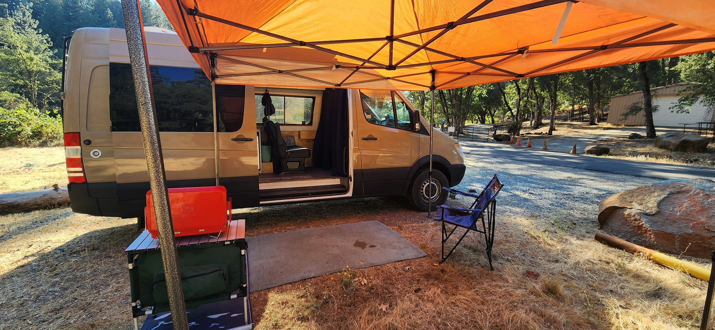  possibly at an RV rental park.|Interior of a cozy camper van — photo 9