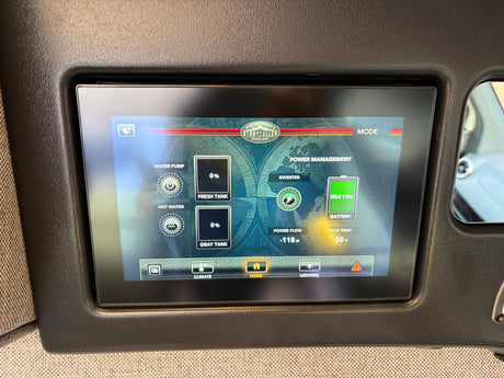 An RV rental control panel shows Storyteller Overland power management: 5d 13hr battery life, -118W power flow, and 0% tank levels.