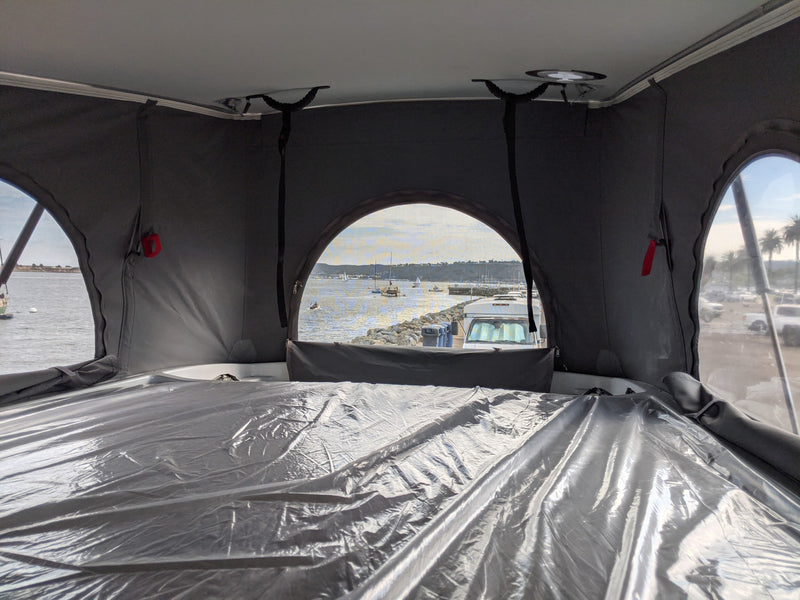  awaits your next adventure.|RV rental van interior: view from open passenger door of seats — photo 13