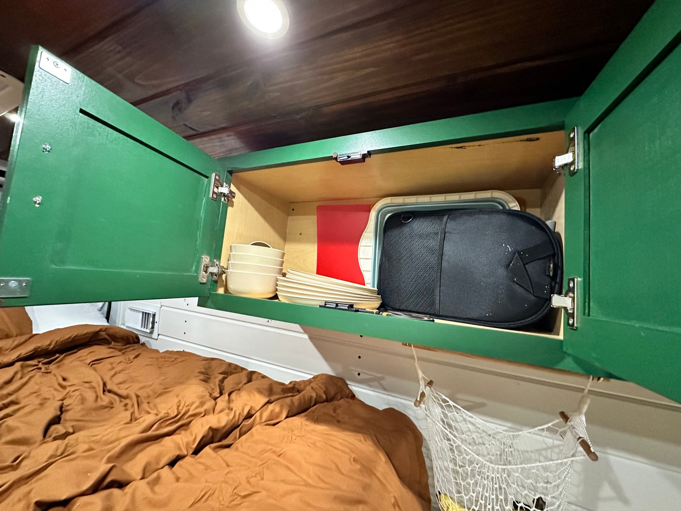  ready for a nature road trip.|Cozy RV rental interior: view of a compact kitchen with a sink — photo 7