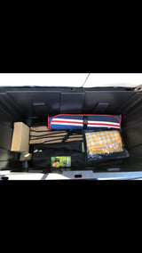 Organized RV rental storage holds camping chairs, picnic blankets, and outdoor essentials for your trip.