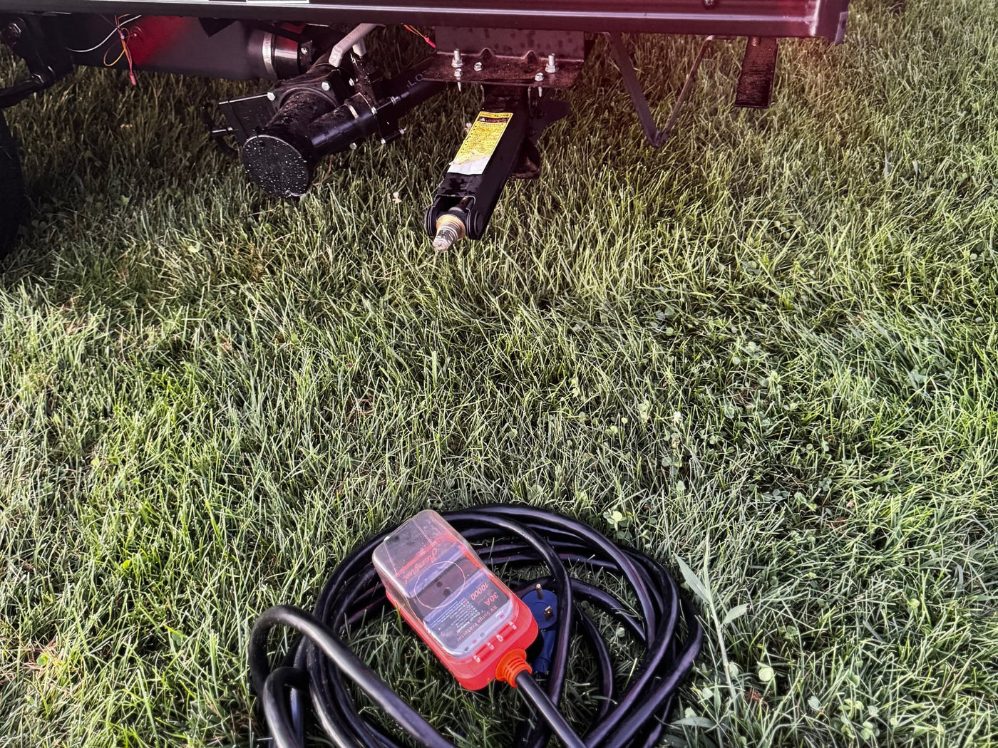  shines under a vibrant sunset. Ready for camping with an extended awning — photo 3
