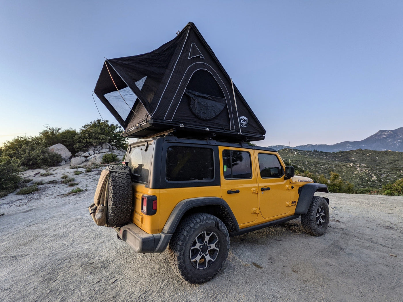  equipped with a rooftop tent for RV rental adventures — photo 3