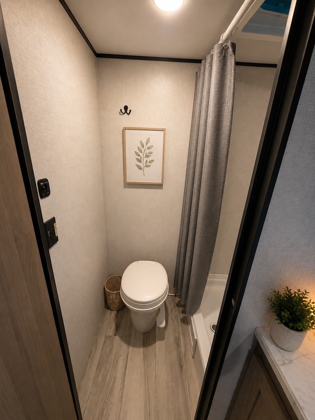  and a cozy electric fireplace.|Modern RV rental interior with a cozy bunk bed — photo 15