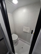  great for an rv rental.|Black toy hauler rv rental shows its rear ramp extended and screen door