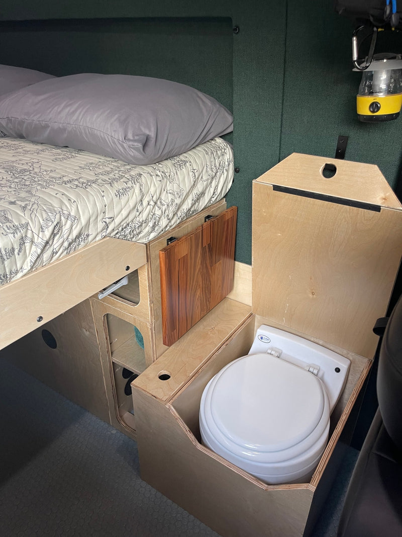  set against stunning red rock mountains.|Experience comfort in this RV rental! Interior features include a cozy bed — photo 6