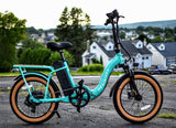 A sleek turquoise electric bike, an ideal companion for your RV rental getaway to explore new paths.