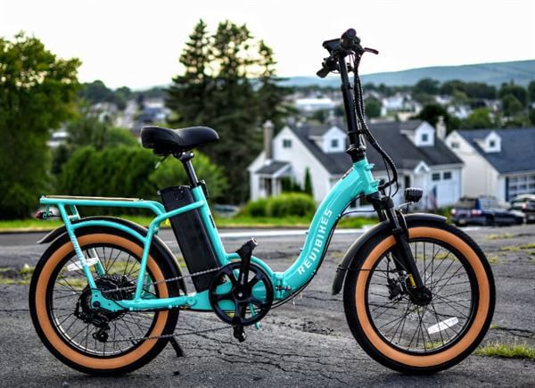  perfect for an rv rental trip.|Grey Jeep tows a rugged off-road RV rental trailer on a dirt road. Perfect for exploring hills & nature under a blue sky!|Gray Jeep towing teardrop RV rental camper on a dirt road. Perfect for off-road adventures and camping.|Two off-road SUVs with attached RV rental teardrop trailers at a desert campsite. Ideal for adventure travel.|Teardrop trailer rv rental with deployed rooftop tent and solar panels — photo 9