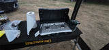 Camping essentials: Coleman stove, propane, and Browning table. Great for an rv rental outdoor kitchen setup.