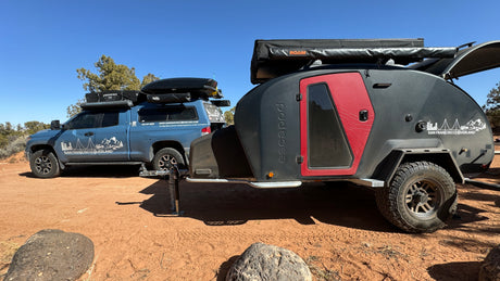 San Francisco Overland: A rugged blue truck & Escapod teardrop trailer, ready for your next rv rental adventure!
