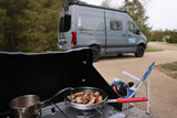 Outdoor cooking by an RV rental: mushrooms sizzling, coffee brewing, ready for adventure.
