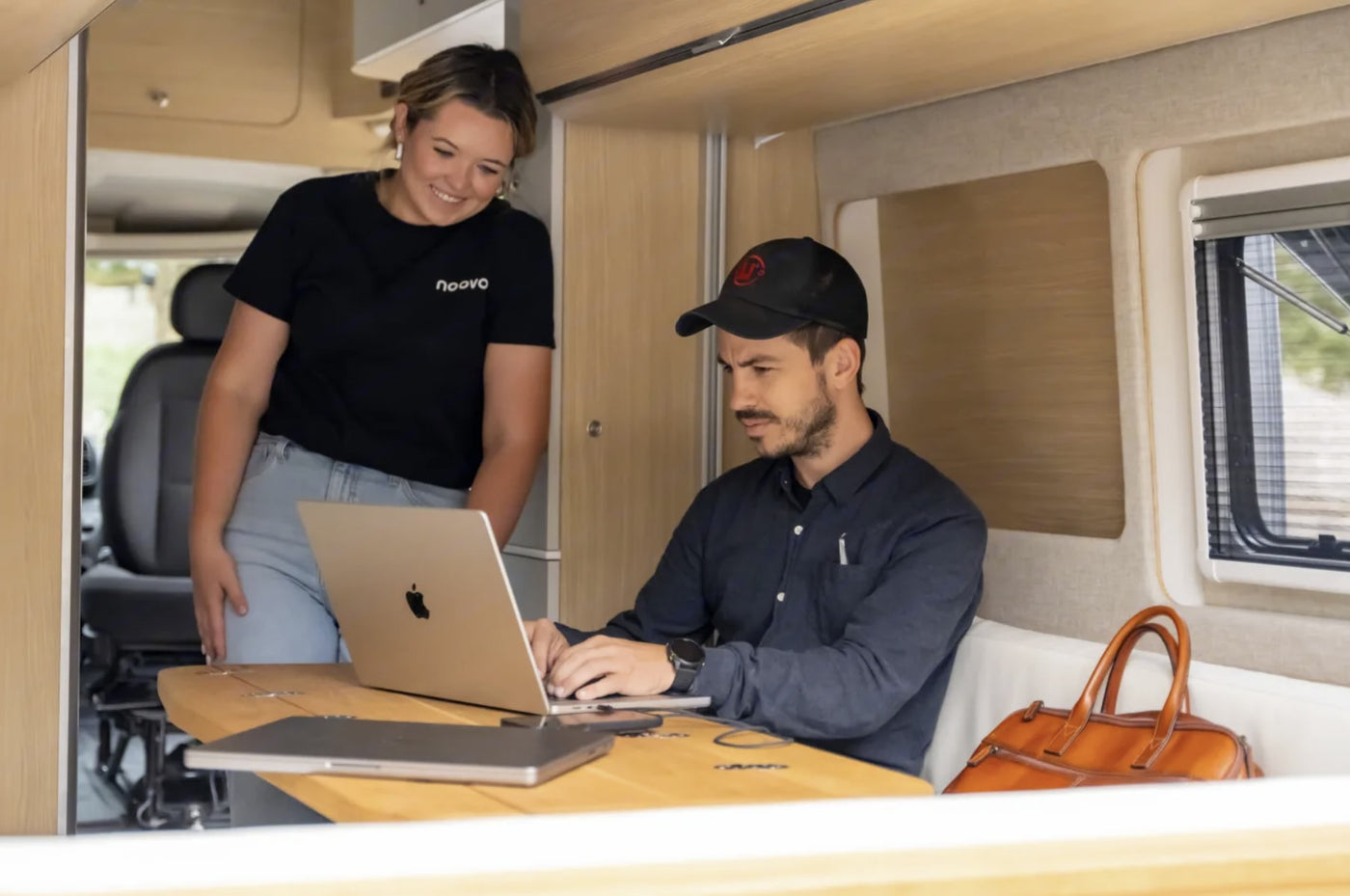  and light wood paneling.|Inside a modern RV rental — photo 5