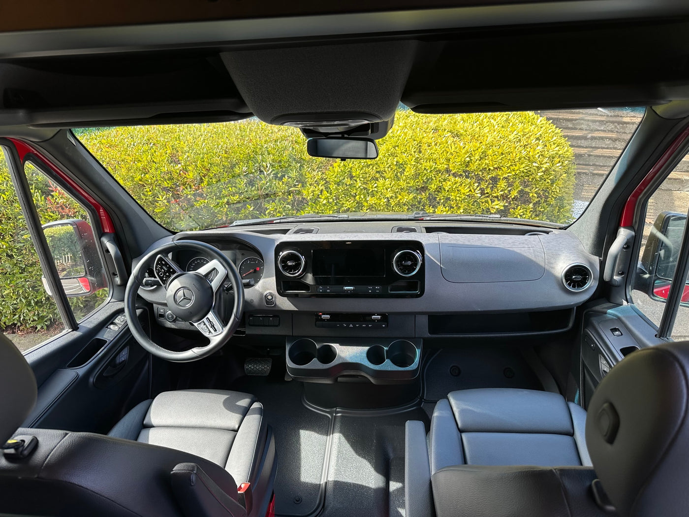  and roof rack. Perfect for an RV rental adventure.|Spacious red camper van interior for your next RV rental adventure — photo 22