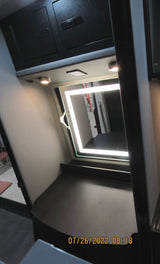  and window blinds for comfortable mobile living.|RV rental interior: Bright white seating/beds