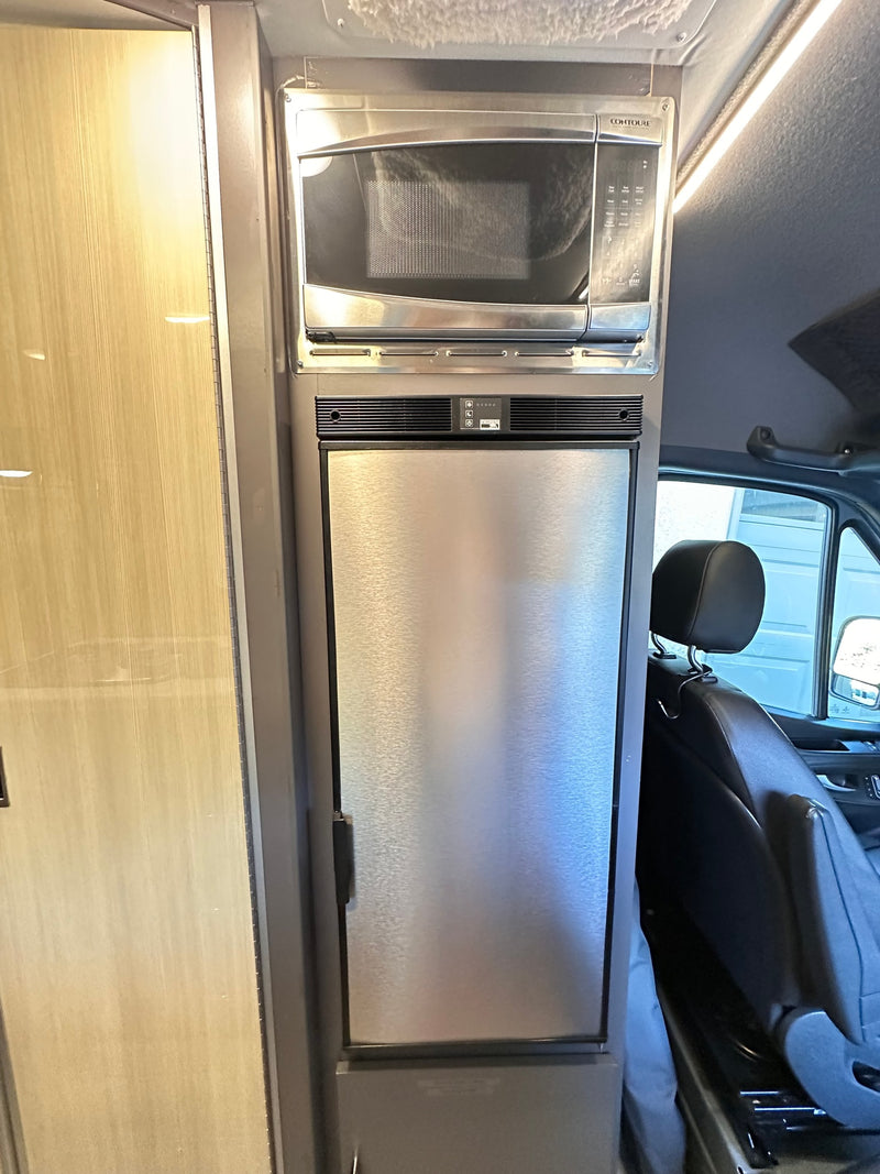  and comfortable dinette.|RV rental interior features a compact — photo 5
