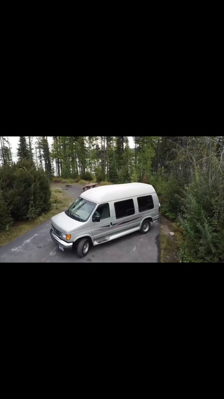  and spacious driver's area for comfortable travel.||Silver RV rental van at Fernie