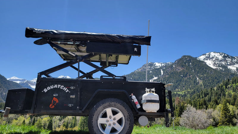  offers mountain adventures.|Experience outdoor cooking! This RV rental setup includes a pull-out stove — photo 3