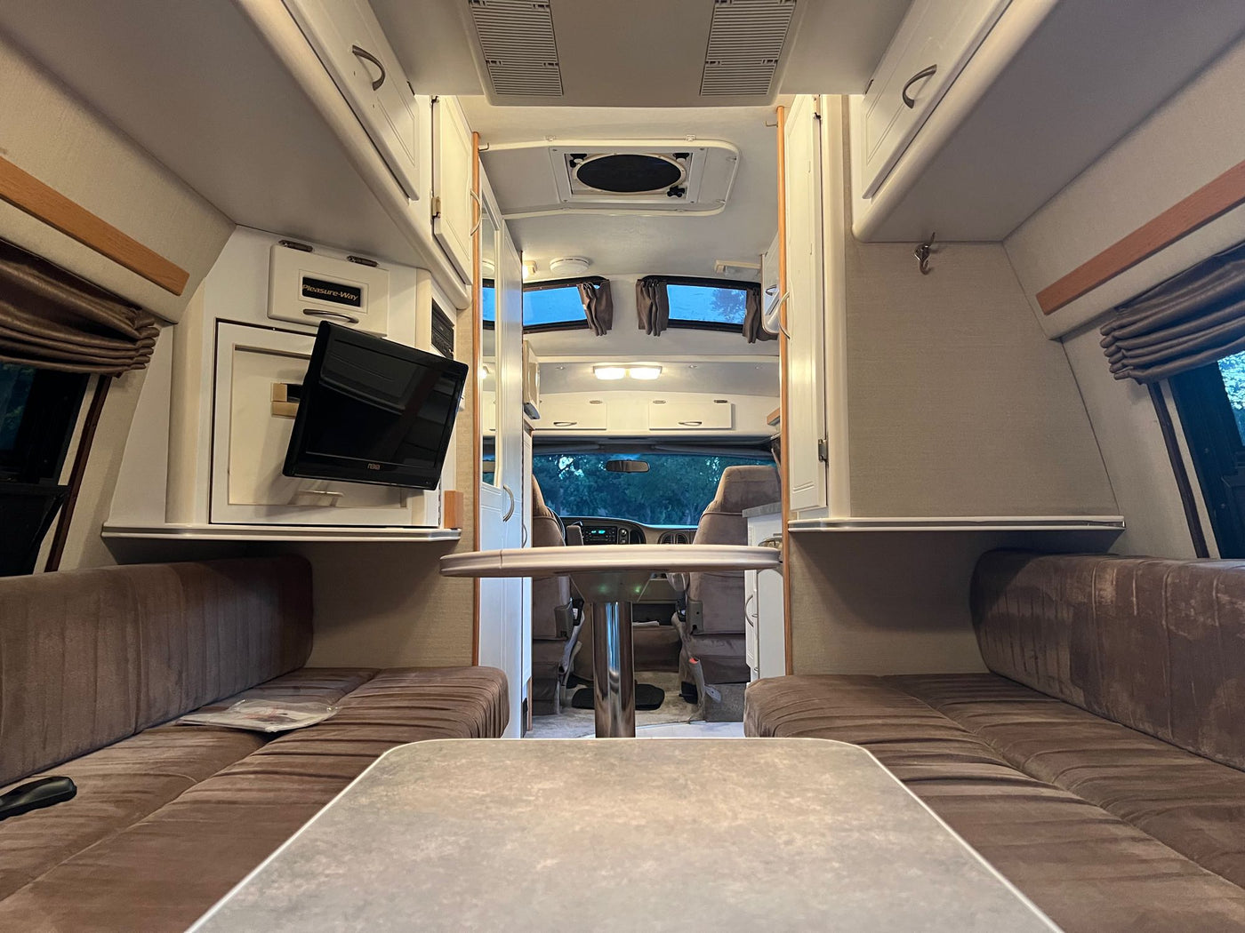  a camper van with dark stripes and chrome wheels — photo 7
