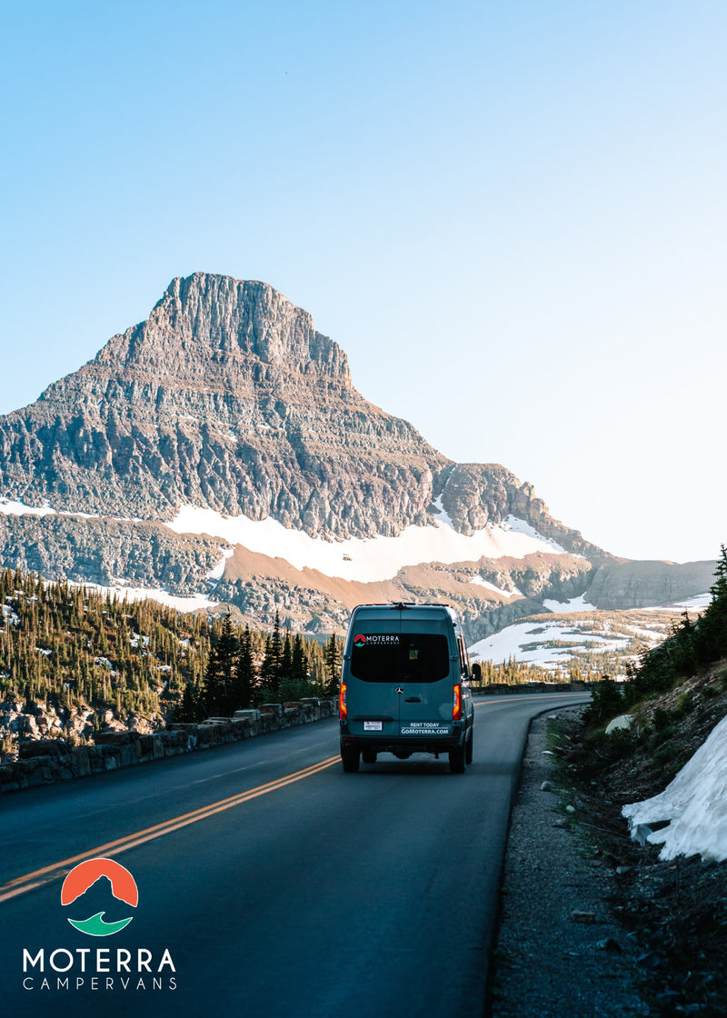  modern interior.|Grey Moterra campervan on a winding mountain road with snow. Your next RV rental adventure awaits here.|RV rental: Campervan parked lakeside at sunset with mountains & person in window. Perfect for scenic travel!|Inside a modern RV rental — photo 2