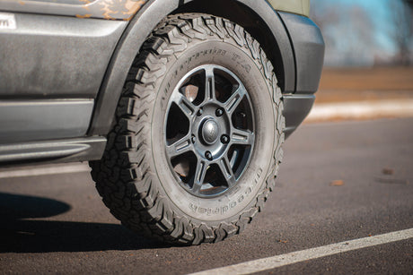 Rugged BFGoodrich All-Terrain tire & custom wheel on an rv rental, ready for adventure.