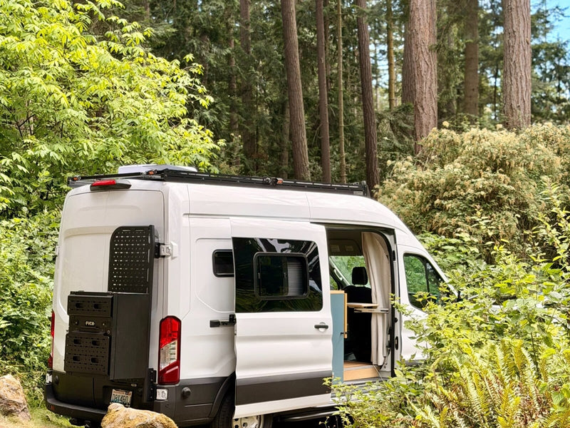  interior visible. Rear cargo rack. Ready for adventure!|RV rental kitchen: compact blue cabinets — photo 3