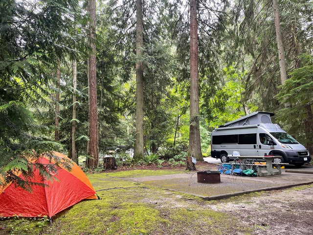 and a small sink area visible.|RV rental cabin: Interior view shows a modern dashboard