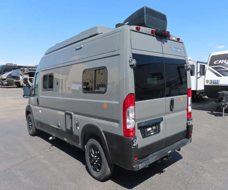 Explore with this gray camper van RV rental, ready for your next adventure.