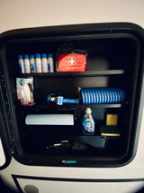 RV rental ready! Organized storage with sunscreen, first aid kit, water hose, dish soap, and cleaning supplies for trips.