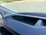 RV rental dashboard: Close-up of interior showing a speaker, USB port, and 12V outlet for charging devices.