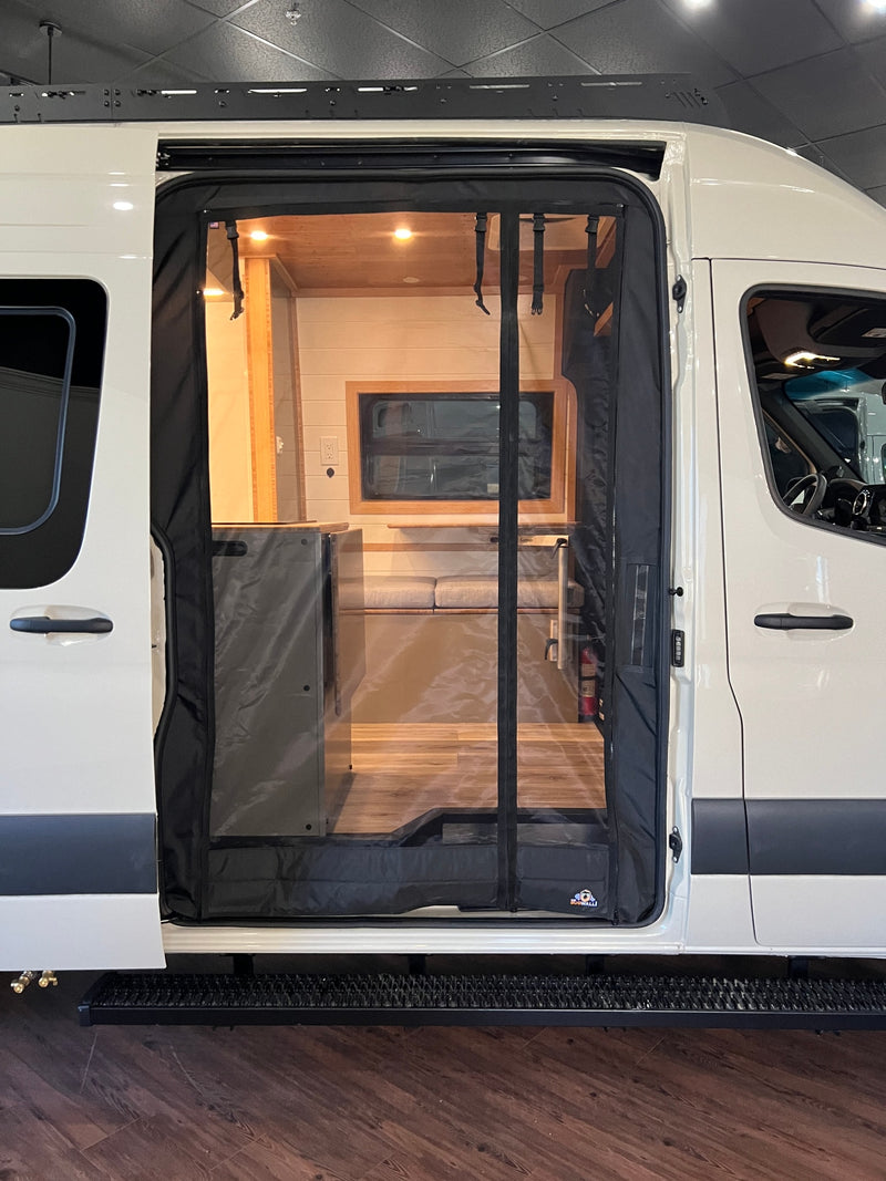  with its side door open to a cozy wooden interior — photo 3