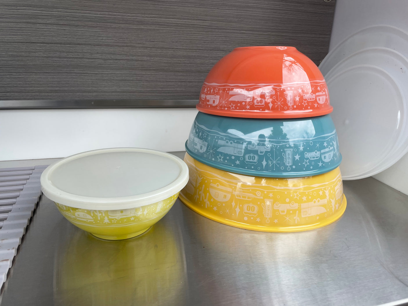 Colorful, vintage-inspired nesting bowls with RV graphics; ideal kitchenware for your rv rental travels.