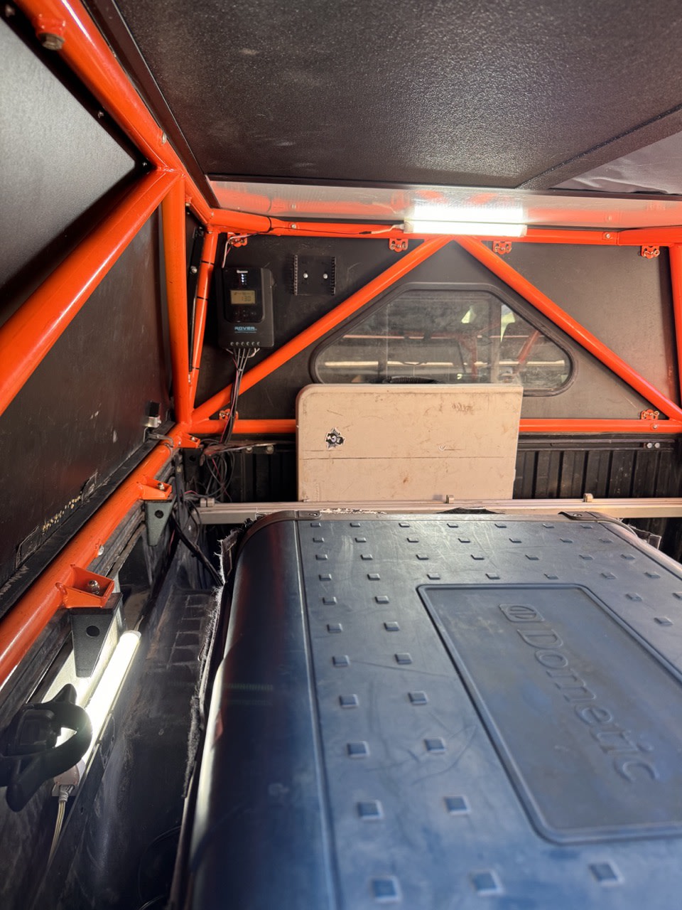 RV rental: Renogy solar charge controller, Dometic fridge, and LED lighting optimize off-grid adventure power.