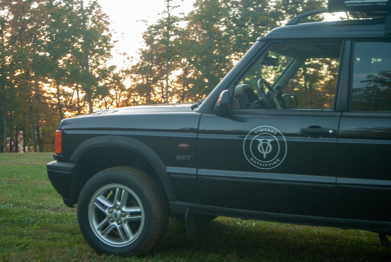  vibrant fall foliage. Explore nature; try an RV rental!|Explore with this black Land Rover SUV — photo 10