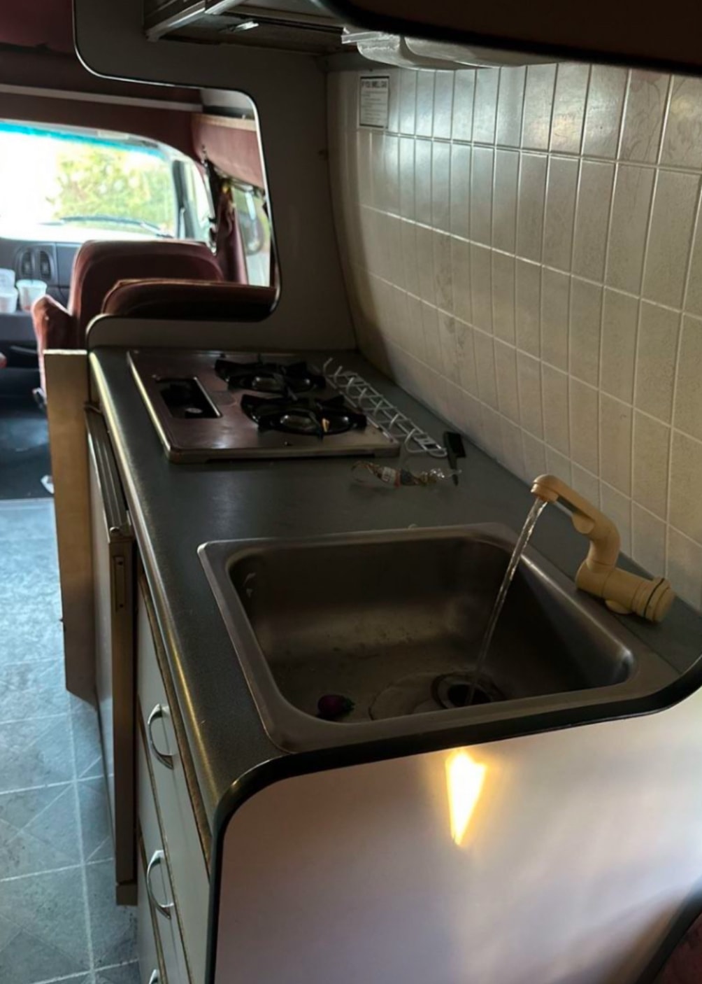  and fire extinguisher below. Ready for adventure.|Cozy sleeping area in an RV rental — photo 9