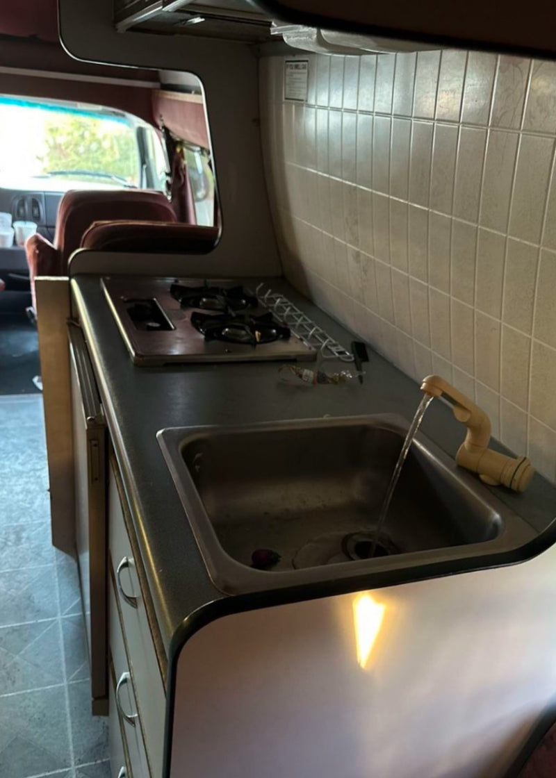  and fire extinguisher below. Ready for adventure.|Cozy sleeping area in an RV rental — photo 9