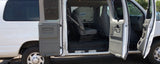 White van with open side and front doors, revealing its versatile interior and seating, ideal for RV rental.