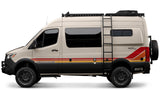 This customized Storyteller Overland adventure van, with its rugged tires and roof rack, is an ideal RV rental for outdoor excursions.